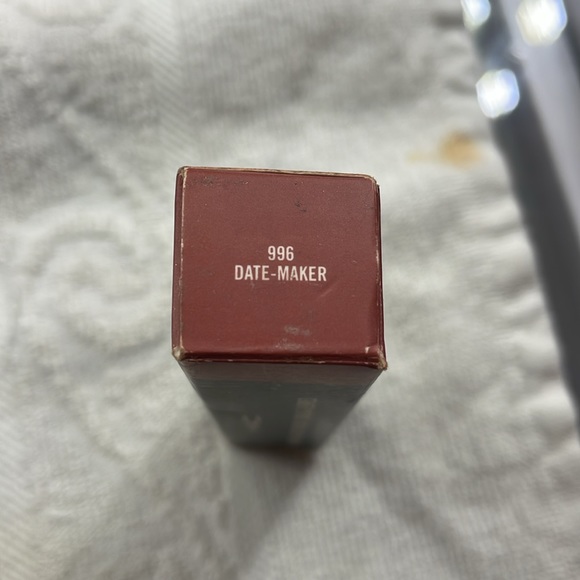 New in  box MAC Powder Kiss liquid lip color. size 0.17 Fl oz. - Picture 2 of 4